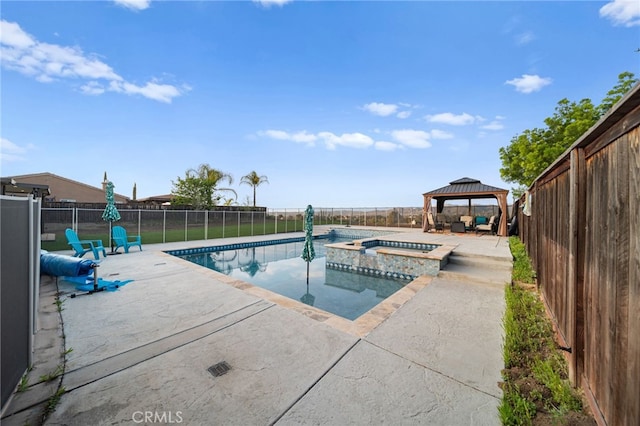 view of pool with a fenced backyard, a gazebo, and a patio area