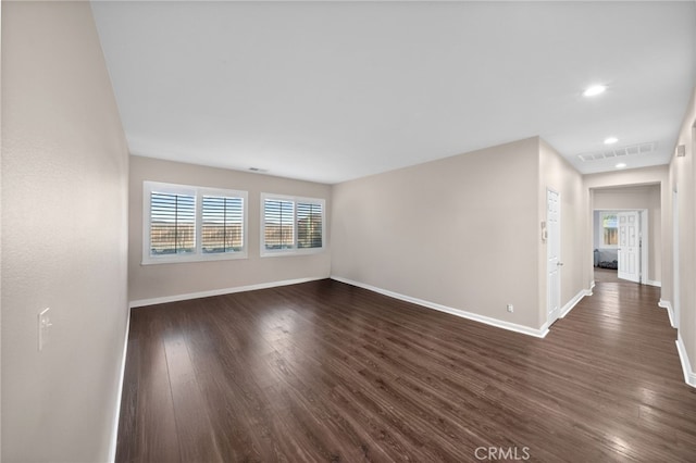 20536 Black Walnut Ct, Wildomar, CA 92595 - spare room with baseboards, dark wood-style flooring, and recessed lighting