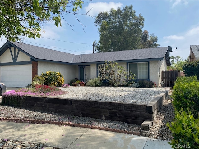 single story home featuring fence, stucco siding, an attached garage, and a shingled roof