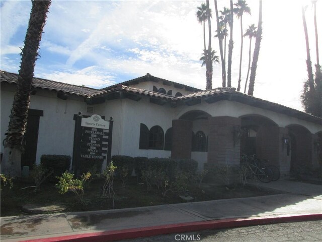 263 Serena Dr, Palm Desert, CA 92260 - mediterranean / spanish house with stucco siding and a tiled roof