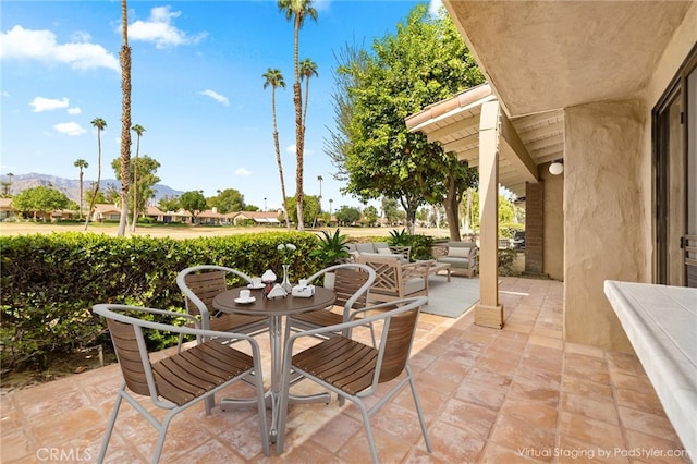 view of patio with a mountain view