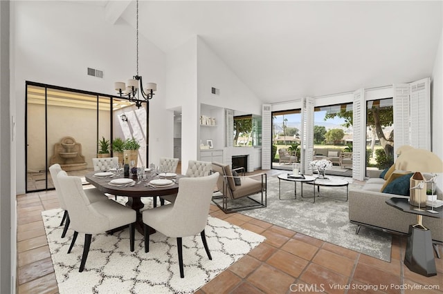 263 Serena Dr, Palm Desert, CA 92260 - tiled dining area featuring high vaulted ceiling, a chandelier, and beamed ceiling