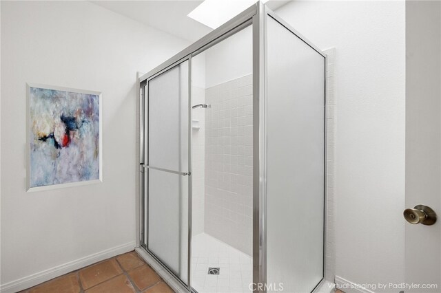 263 Serena Dr, Palm Desert, CA 92260 - bathroom featuring a stall shower, tile patterned floors, and baseboards