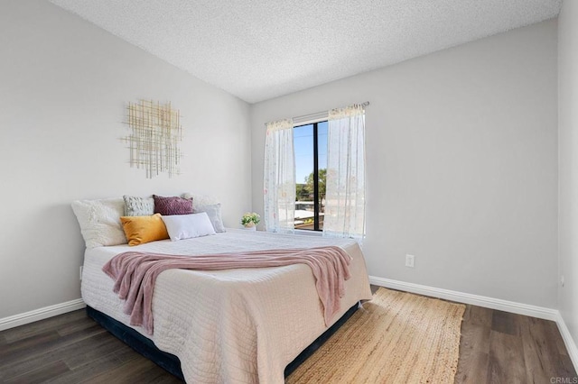 5170 Clairemont Mesa Blvd Unit 27, San Diego, CA 92117 - bedroom with wood finished floors and a textured ceiling