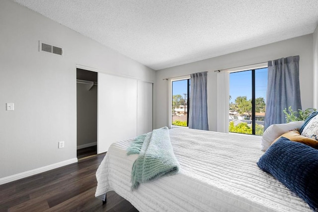 5170 Clairemont Mesa Blvd Unit 27, San Diego, CA 92117 - bedroom with wood finished floors, a textured ceiling, lofted ceiling, and a closet
