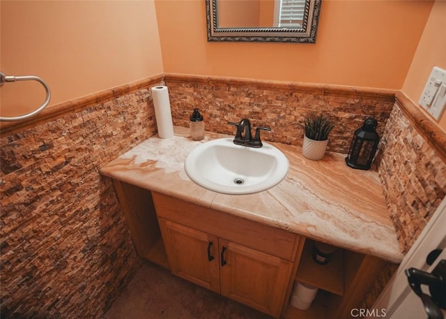 1153 San Rafael Ave Unit 105, Glendale, CA 91202 - bathroom featuring a wainscoted wall and vanity