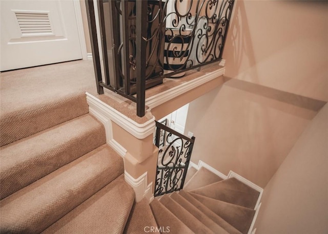 1153 San Rafael Ave Unit 105, Glendale, CA 91202 - stairway with carpet flooring and baseboards