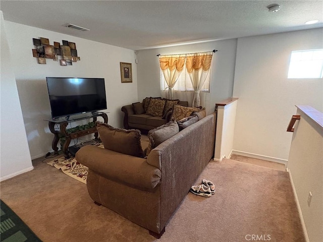 3324 Rosegold Ave, Rosamond, CA 93560 - living room with baseboards, carpet, and visible vents