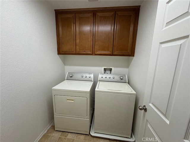 3324 Rosegold Ave, Rosamond, CA 93560 - laundry room with separate washer and dryer, cabinet space, baseboards, and visible vents