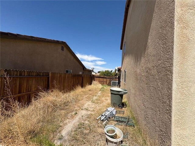 3324 Rosegold Ave, Rosamond, CA 93560 - view of side of property with fence and stucco siding