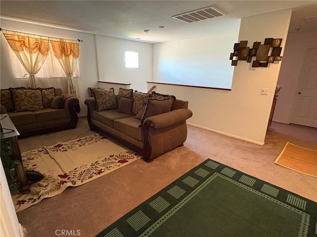 3324 Rosegold Ave, Rosamond, CA 93560 - living room featuring carpet floors, baseboards, and visible vents