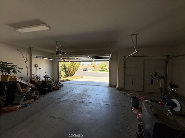 3324 Rosegold Ave, Rosamond, CA 93560 - garage featuring a garage door opener