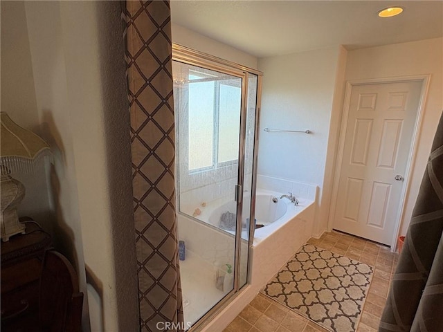 3324 Rosegold Ave, Rosamond, CA 93560 - bathroom with recessed lighting, a garden tub, and a stall shower