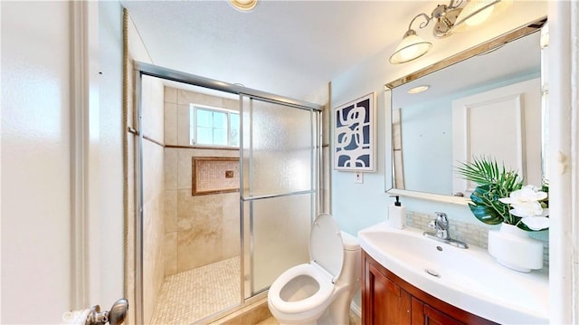 19201 Barrett Ln, North Tustin, CA 92705 - bathroom featuring vanity, toilet, and a stall shower