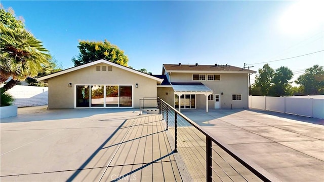 19201 Barrett Ln, North Tustin, CA 92705 - rear view of property with stucco siding and a patio