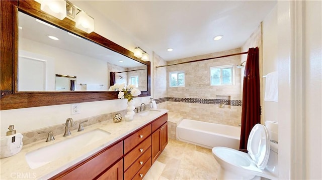 19201 Barrett Ln, North Tustin, CA 92705 - bathroom with double vanity, shower / bath combo with shower curtain, toilet, and recessed lighting