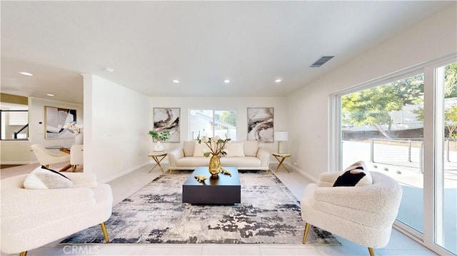19201 Barrett Ln, North Tustin, CA 92705 - living room with healthy amount of natural light, recessed lighting, and baseboards