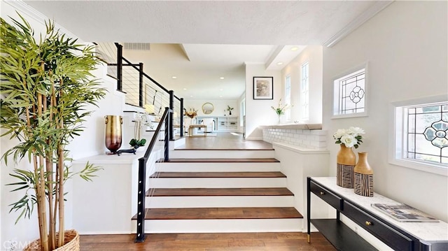 19201 Barrett Ln, North Tustin, CA 92705 - stairs featuring wood finished floors and recessed lighting