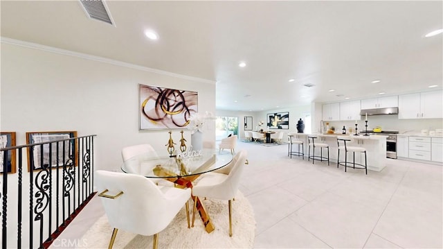 19201 Barrett Ln, North Tustin, CA 92705 - dining area featuring ornamental molding, recessed lighting, and light tile patterned flooring