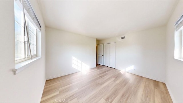 19201 Barrett Ln, North Tustin, CA 92705 - spare room featuring light wood finished floors and baseboards
