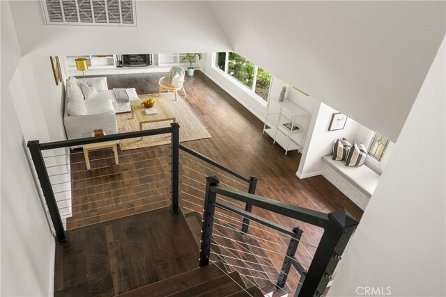 19201 Barrett Ln, North Tustin, CA 92705 - staircase with wood finished floors and baseboards