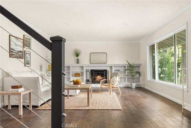 19201 Barrett Ln, North Tustin, CA 92705 - living room featuring ornamental molding, a lit fireplace, and dark wood finished floors