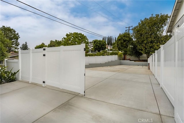 19201 Barrett Ln, North Tustin, CA 92705 - view of patio featuring a gate