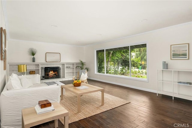 19201 Barrett Ln, North Tustin, CA 92705 - living area with ornamental molding, hardwood / wood-style floors, and a lit fireplace