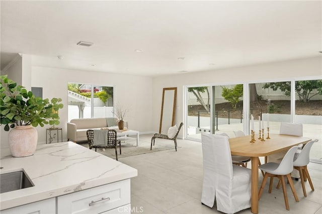 19201 Barrett Ln, North Tustin, CA 92705 - dining area featuring plenty of natural light and light tile patterned floors