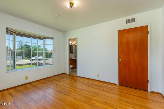 524 N 14th St, Santa Paula, CA 93060 - empty room featuring wood finished floors, baseboards, and a smoke detector