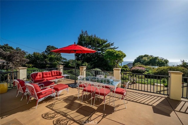 view of patio featuring outdoor lounge area and outdoor dining space