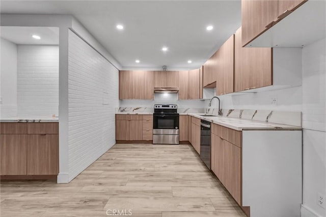 kitchen with stainless steel range with electric stovetop, a sink, light wood-style floors, dishwashing machine, and under cabinet range hood
