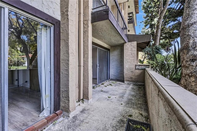 entrance to property with a balcony