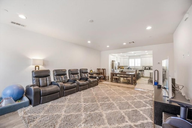 40925 Lacroix Ave, Murrieta, CA 92562 - living room featuring light wood finished floors, visible vents, and recessed lighting