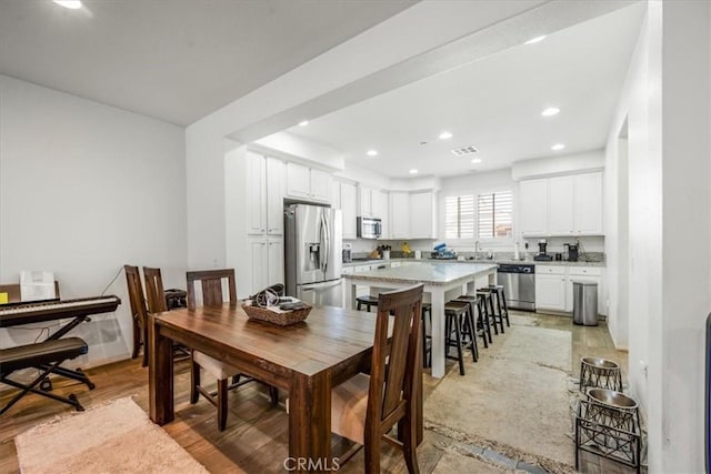 40925 Lacroix Ave, Murrieta, CA 92562 - dining space featuring recessed lighting and light wood-style flooring