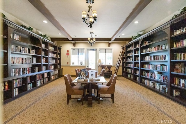 living area with beam ceiling, bookshelves, and recessed lighting