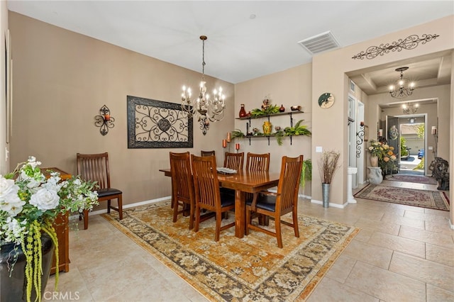 dining area with visible vents, baseboards, and a notable chandelier