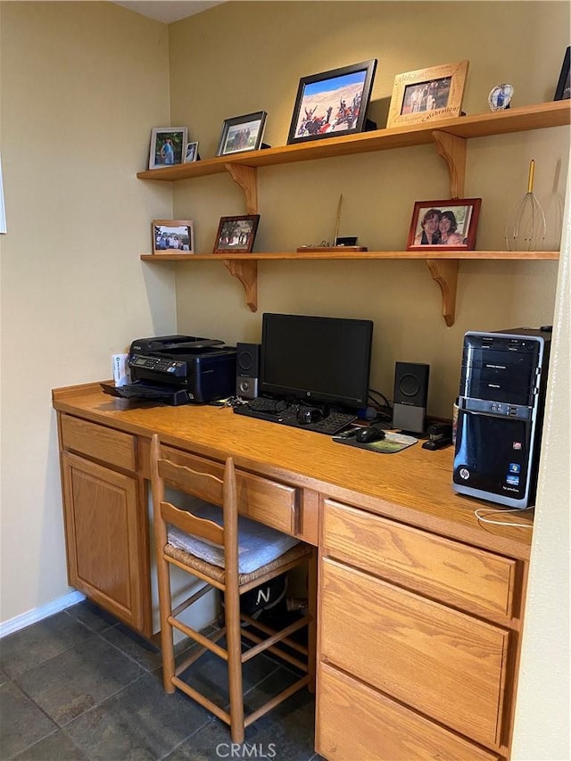 office area featuring baseboards