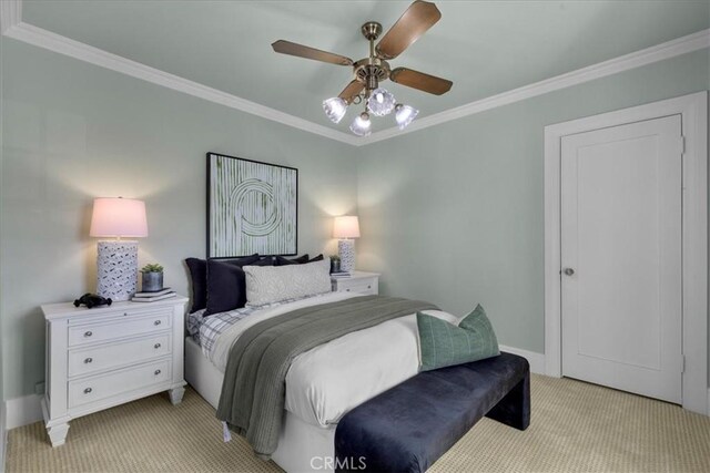 1239 S Patton Ave, San Pedro, CA 90731 - bedroom with light carpet, ornamental molding, and a ceiling fan