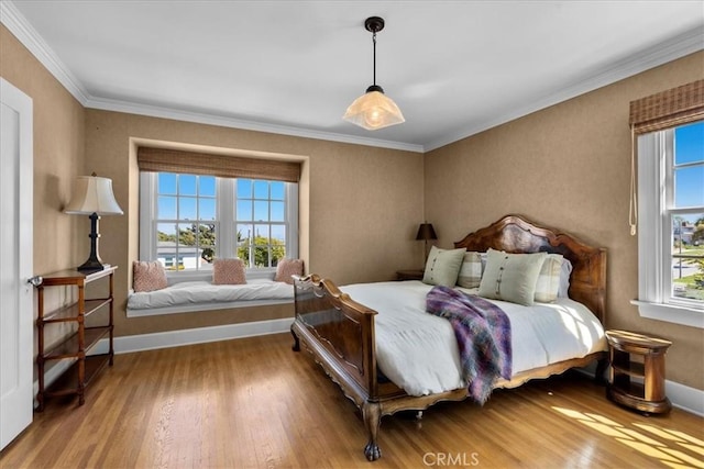 1239 S Patton Ave, San Pedro, CA 90731 - bedroom featuring wood finished floors and ornamental molding