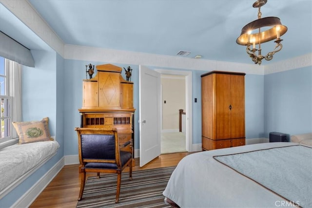 1239 S Patton Ave, San Pedro, CA 90731 - bedroom with dark wood-style floors