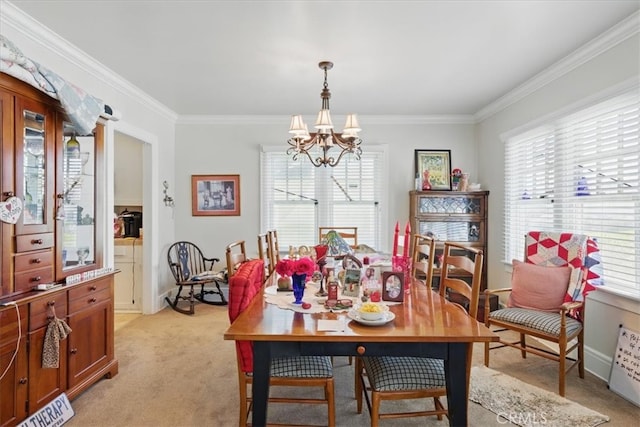 1239 S Patton Ave, San Pedro, CA 90731 - dining space featuring a chandelier, light colored carpet, ornamental molding, and plenty of natural light