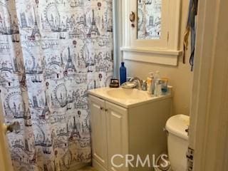 1239 S Patton Ave, San Pedro, CA 90731 - bathroom featuring vanity and a shower with shower curtain