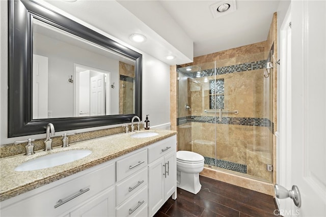 195 Hartford Dr Unit 111, Newport Beach, CA 92660 - bathroom with a sink, toilet, double vanity, and a stall shower