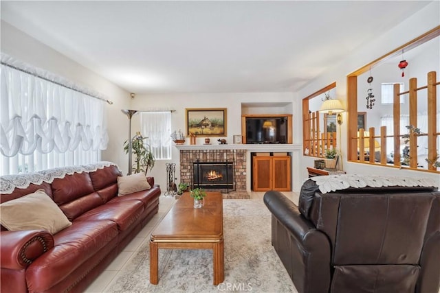 living room featuring built in features and a fireplace