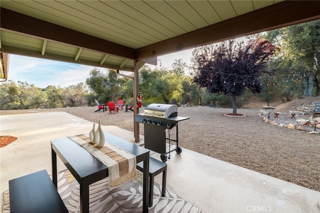 view of patio featuring a grill
