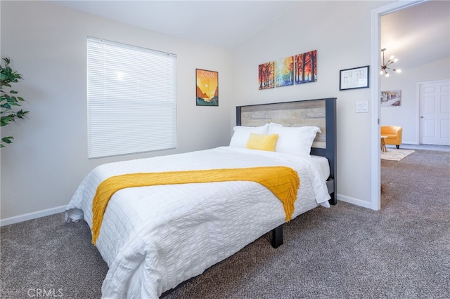 bedroom featuring baseboards, vaulted ceiling, and carpet