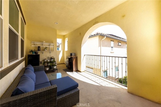 exterior space featuring carpet floors