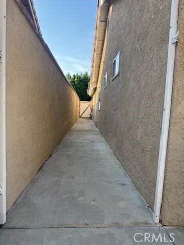 view of side of property featuring stucco siding