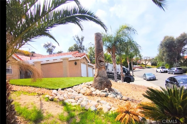 view of yard with a garage